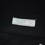 Inside black pants size label: PRADA Milano 54