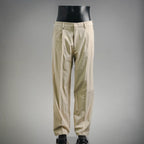 Beige Prada pants on mannequin, front view, belt loops and straight leg