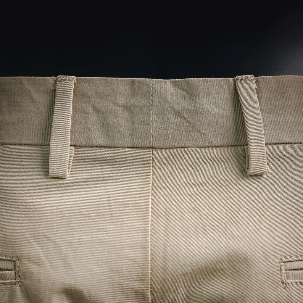 Beige Prada pants waistband with belt loops and buttoned closure