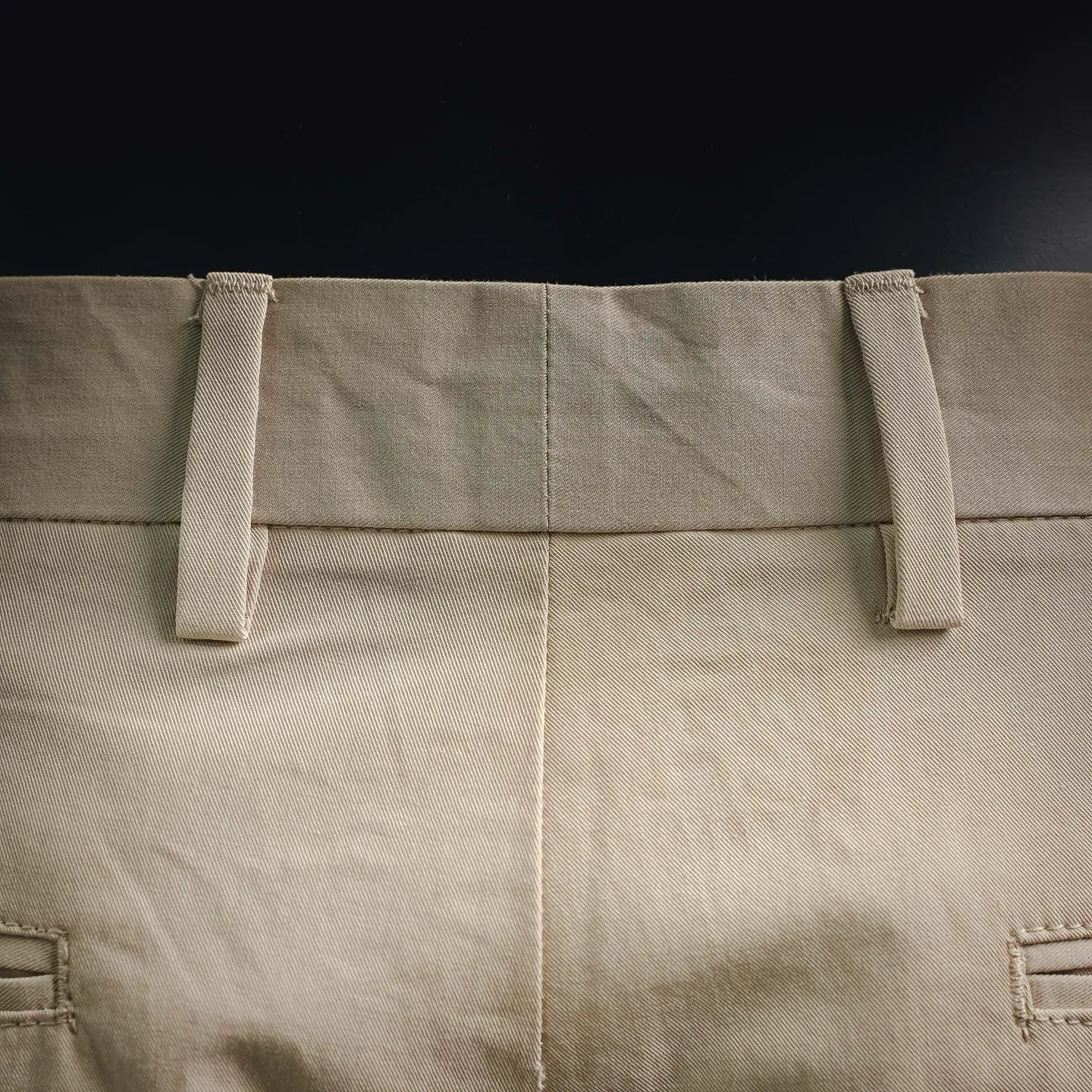 Beige Prada pants waistband with belt loops and buttoned closure