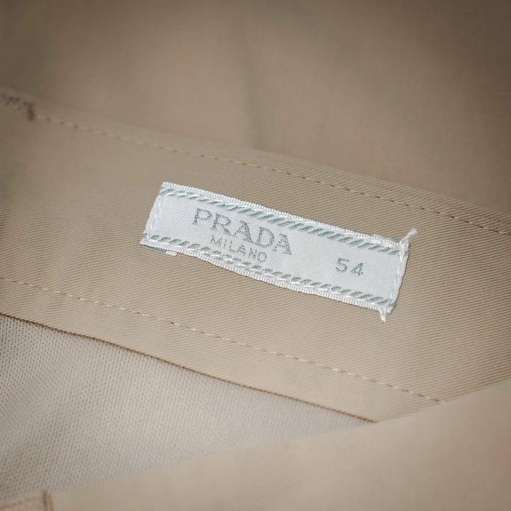 Beige Prada pants size label PRADA Milano 54 on inner waistband