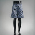 Prada blue floral print shorts with elastic waistband and side seams on mannequin