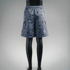 Prada blue floral print shorts with elastic waistband on mannequin, back view