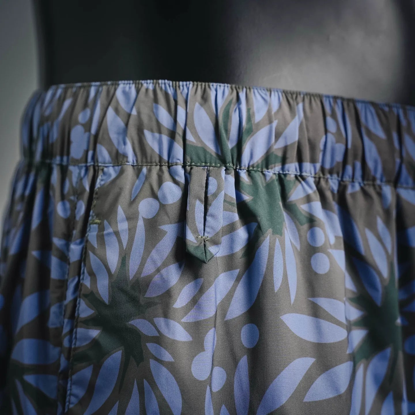 Prada blue floral print shorts with center seam and elastic waistband detail