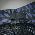 Prada shorts inner waistband label with size 52 tag and drawstring ties