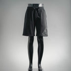 Prada black drawstring shorts with relaxed fit and side zipper pocket
