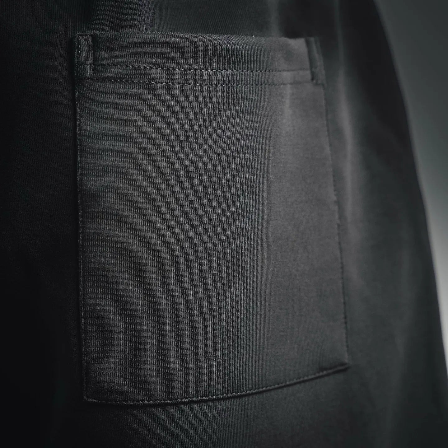 Prada black shorts side patch pocket detail with stitched border