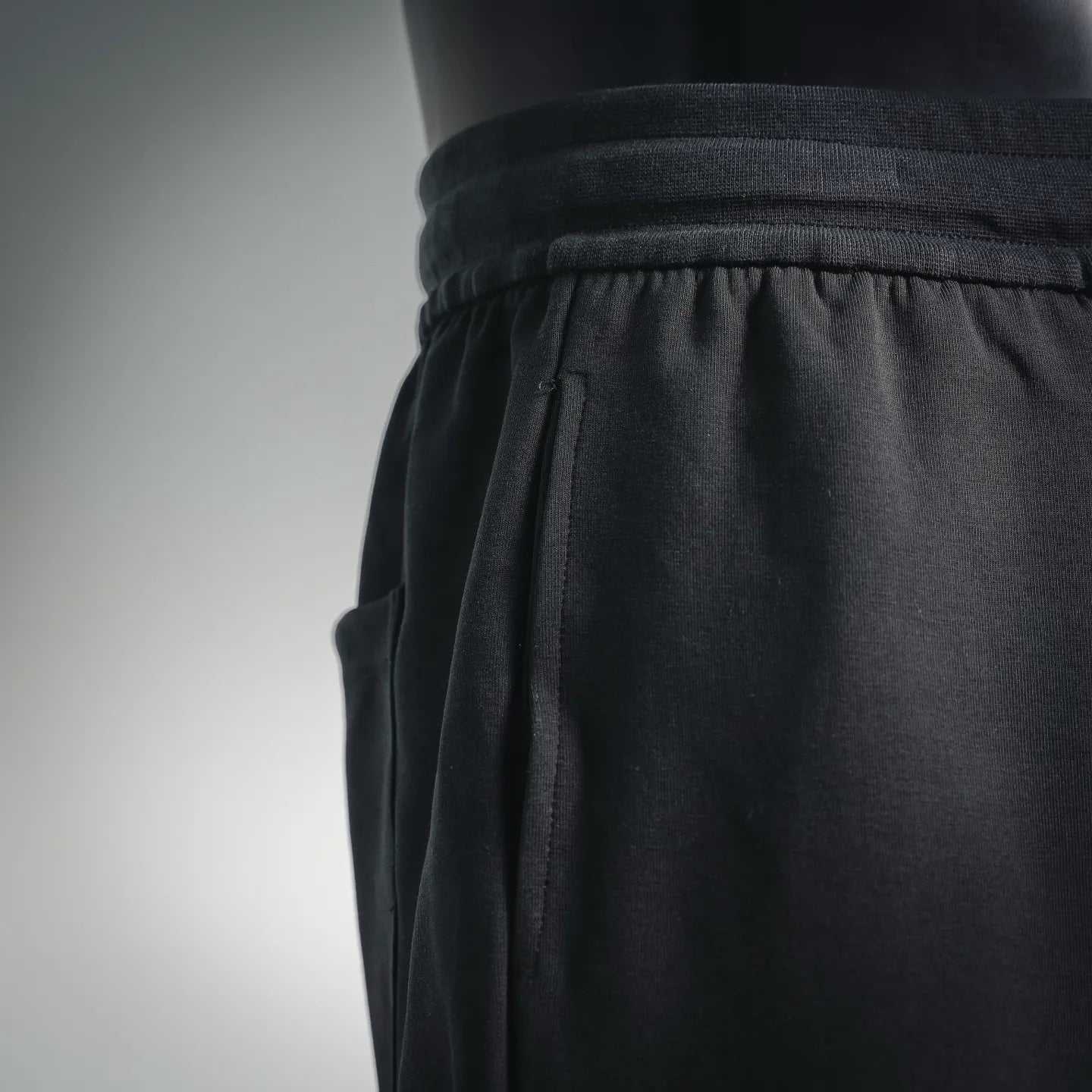 Prada black shorts front with elastic waistband and side seam