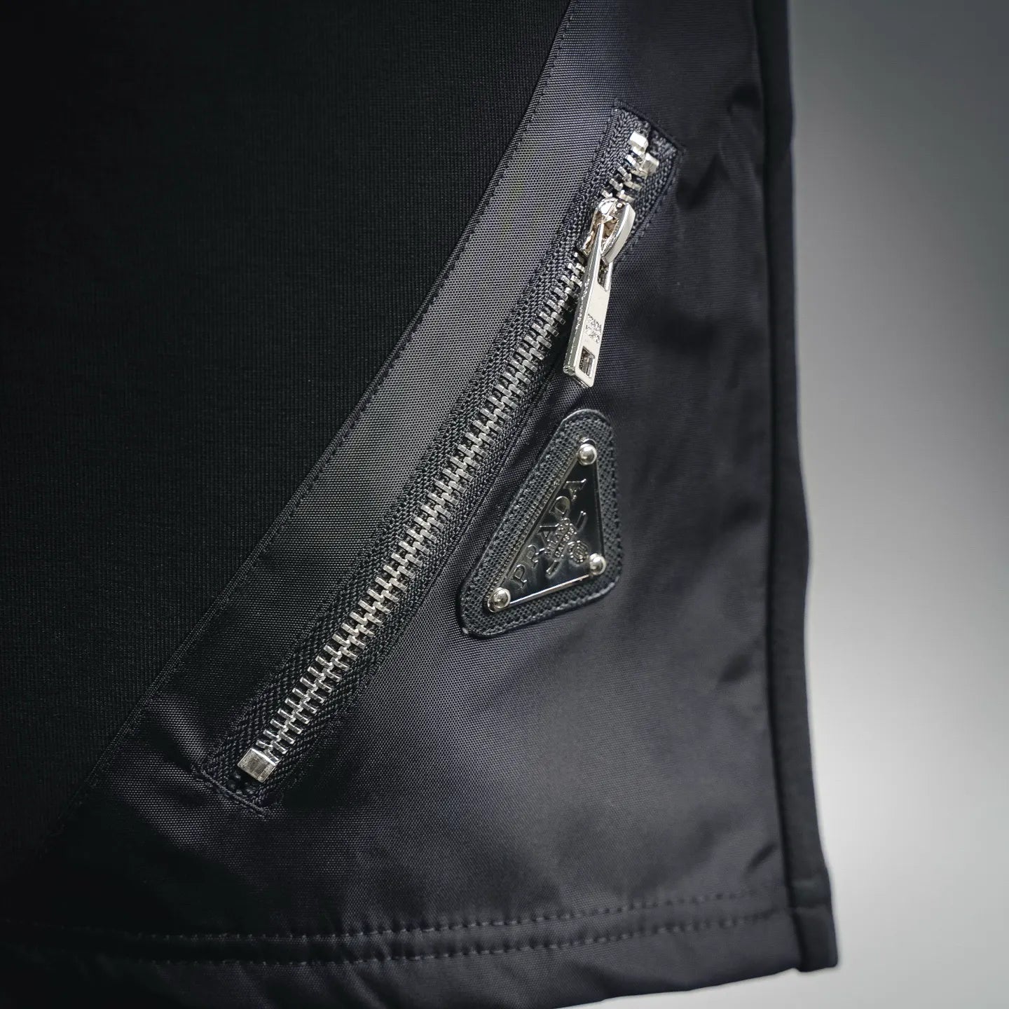 Prada black shorts side zipper pocket with triangle metal pull tab
