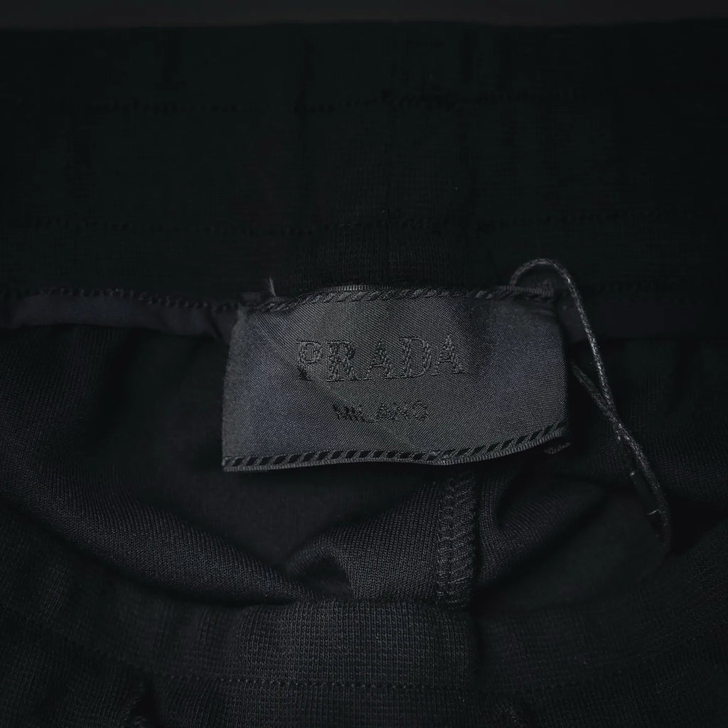 Prada black shorts inner label tag near waistband seam