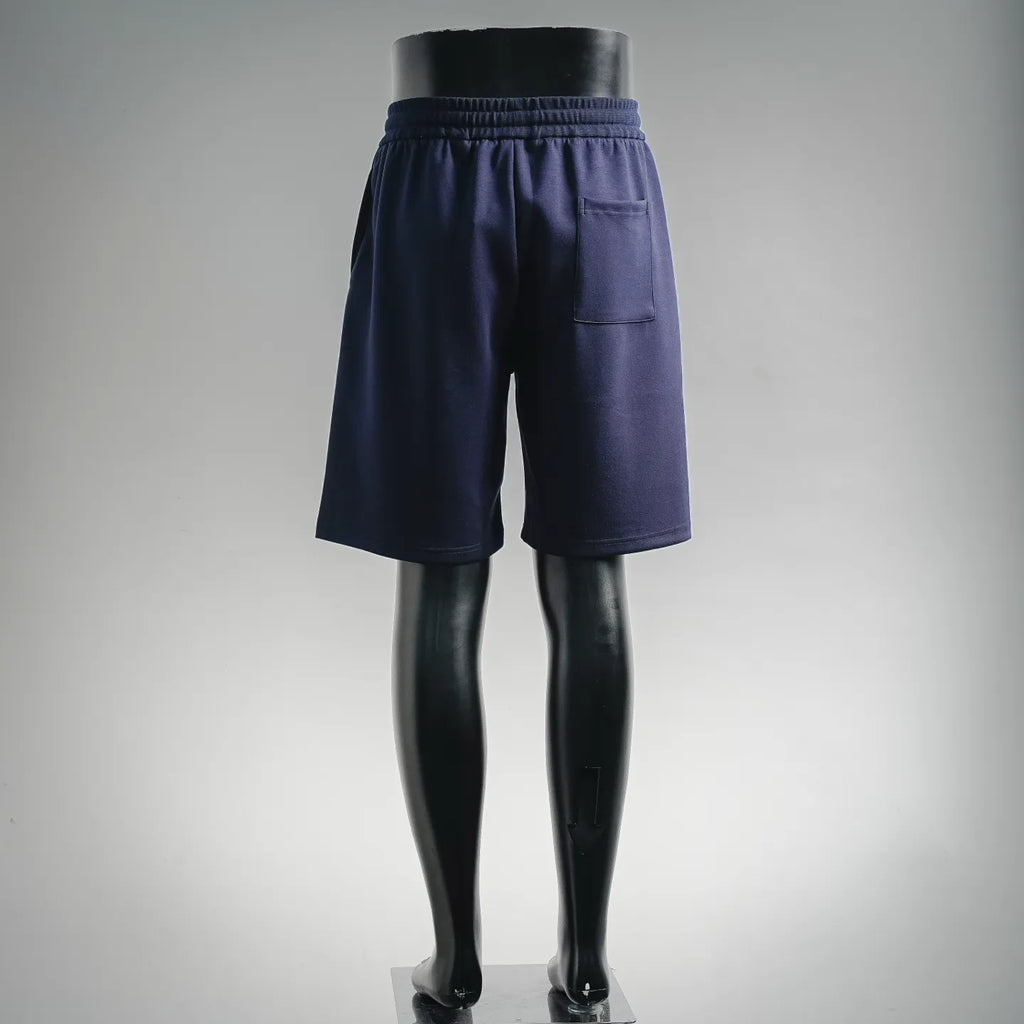 Navy knee-length shorts with elastic waistband and side pocket