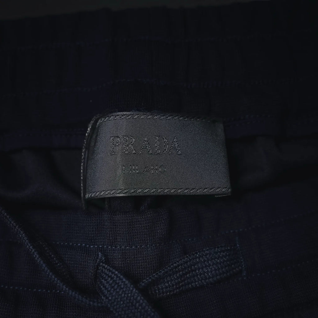 Prada logo patch on navy shorts inner waistband