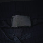 Prada logo patch on navy shorts inner waistband