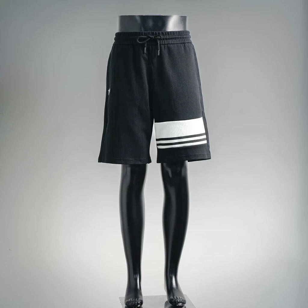 Black Prada drawstring shorts with white triple stripe at hem
