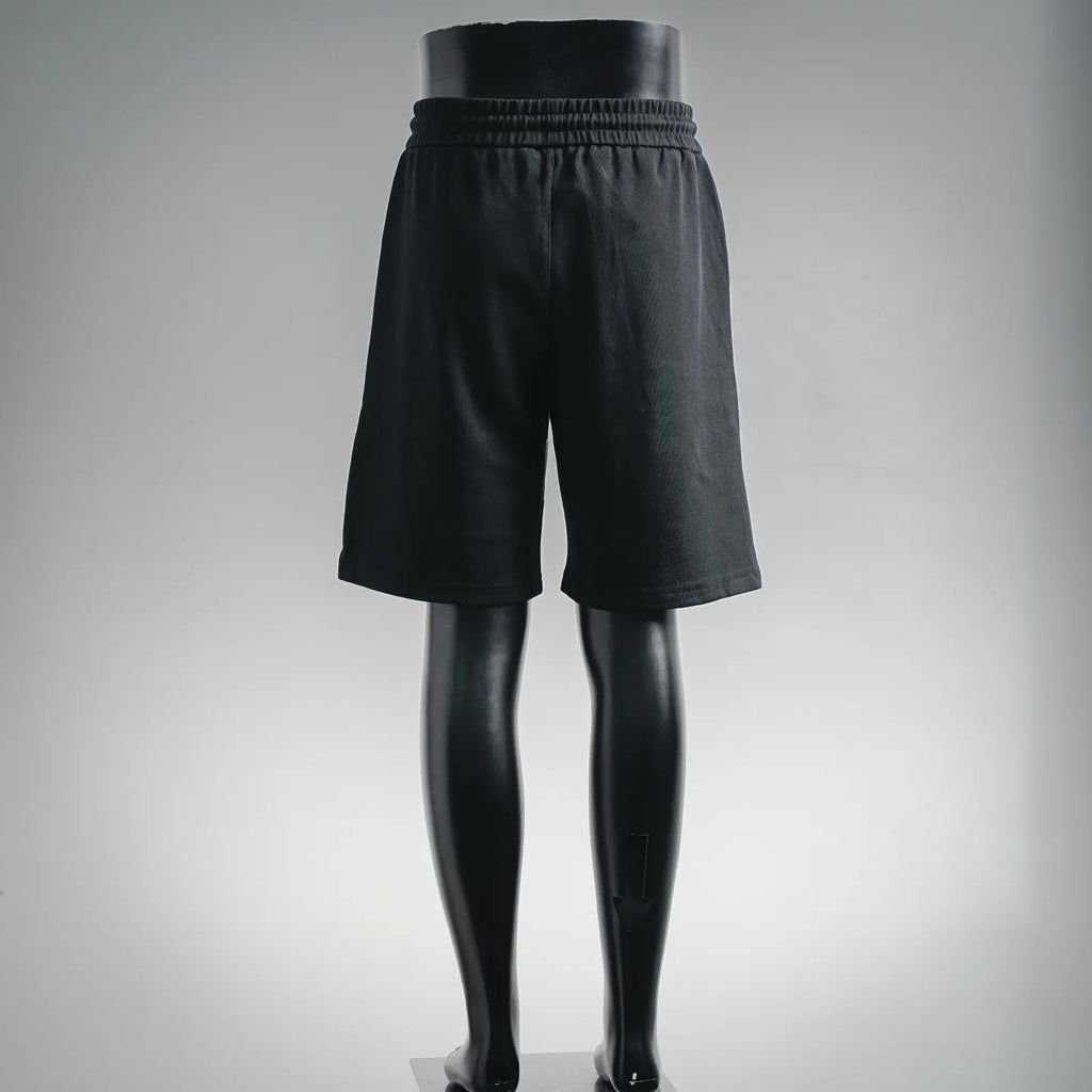 Black Prada elastic waist shorts, back view