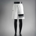 White drawstring shorts with black PRADA logo patch and striped hem trim