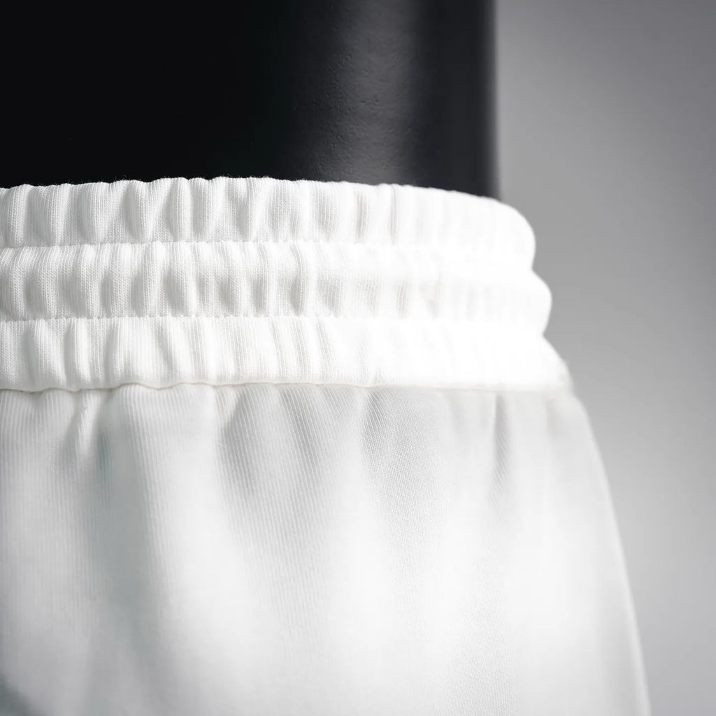White elastic waistband with gathered texture detail