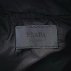 Interior black jacket label with PRADA text