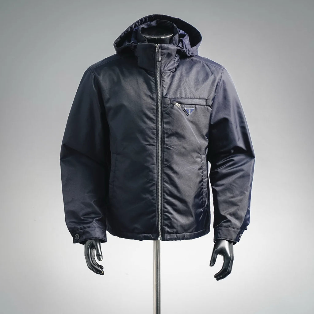 Navy hooded puffer jacket with full zip and triangular Prada chest logo patch