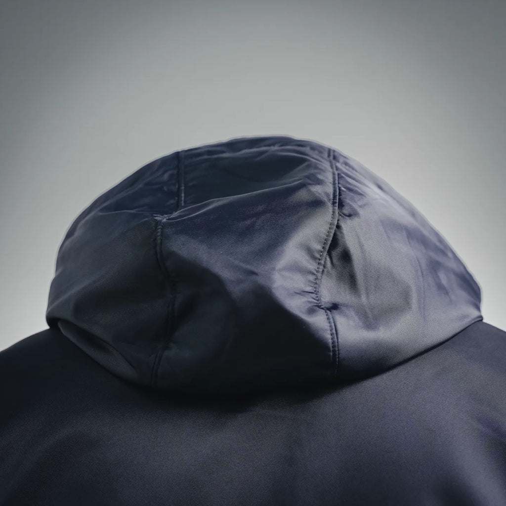 Navy hood with stitched seams on a padded jacket