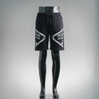 Black Prada logo shorts with elastic waistband and drawstring, front view