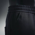 Black shorts waistband with drawstring channel and seam detail