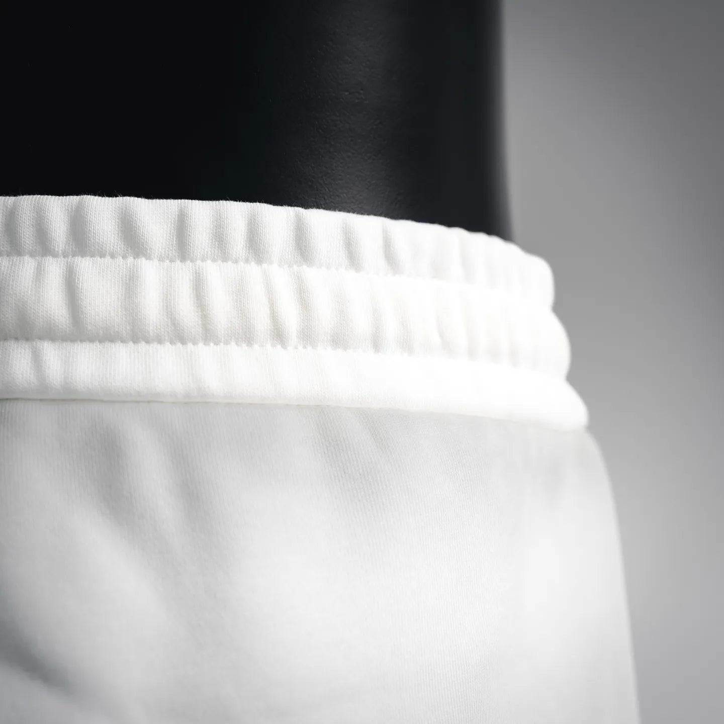 White shorts waistband with elastic gathers