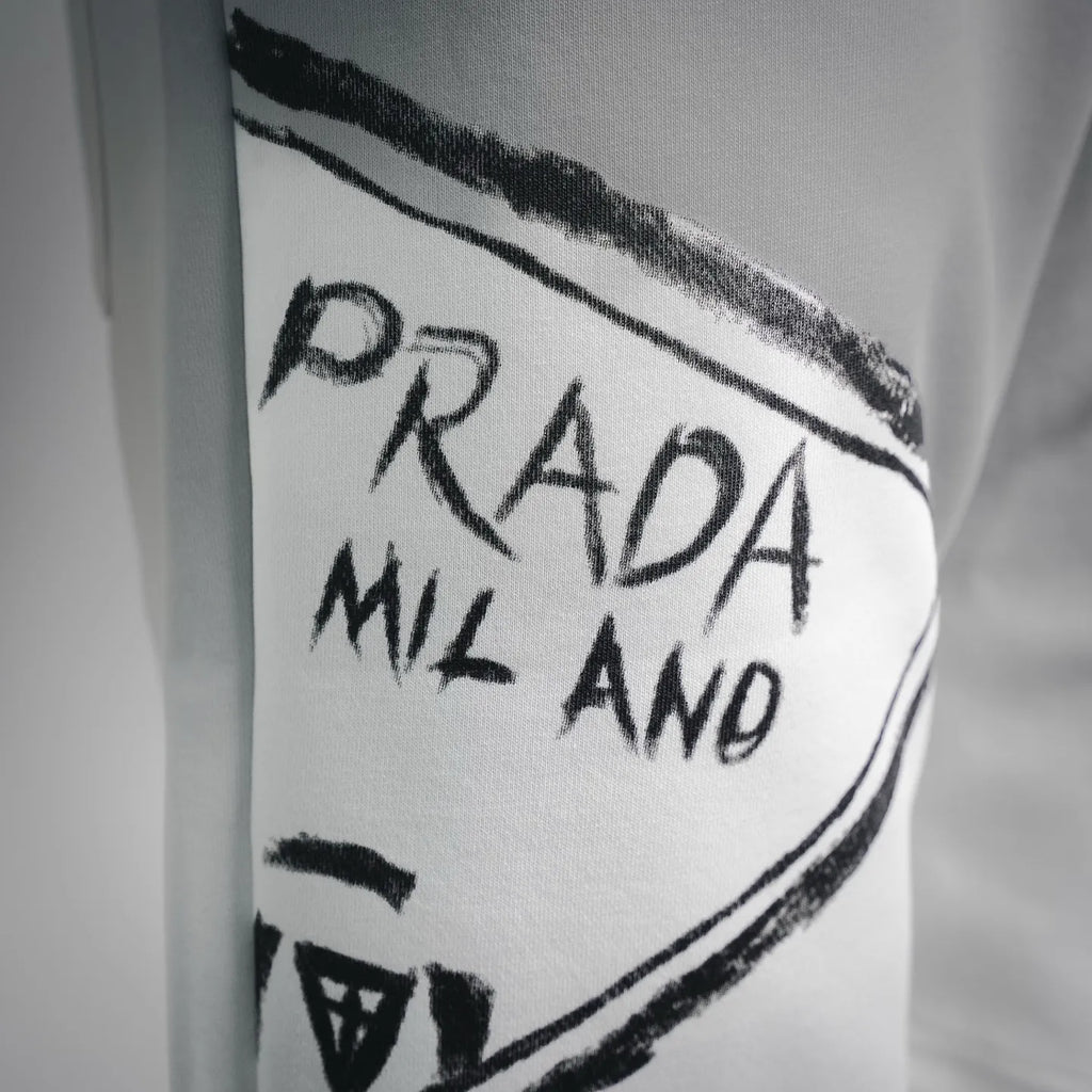 White shorts leg panel with Prada Milano logo print