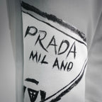White shorts leg panel with Prada Milano logo print