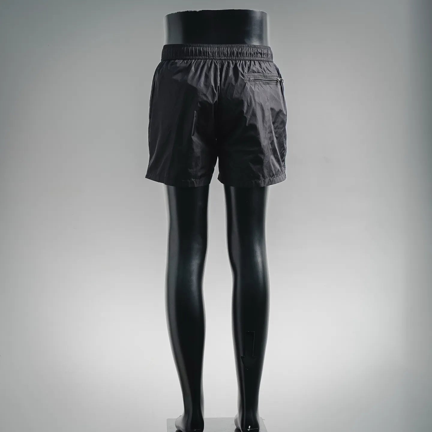 Prada black drawstring shorts, back view with elastic waistband