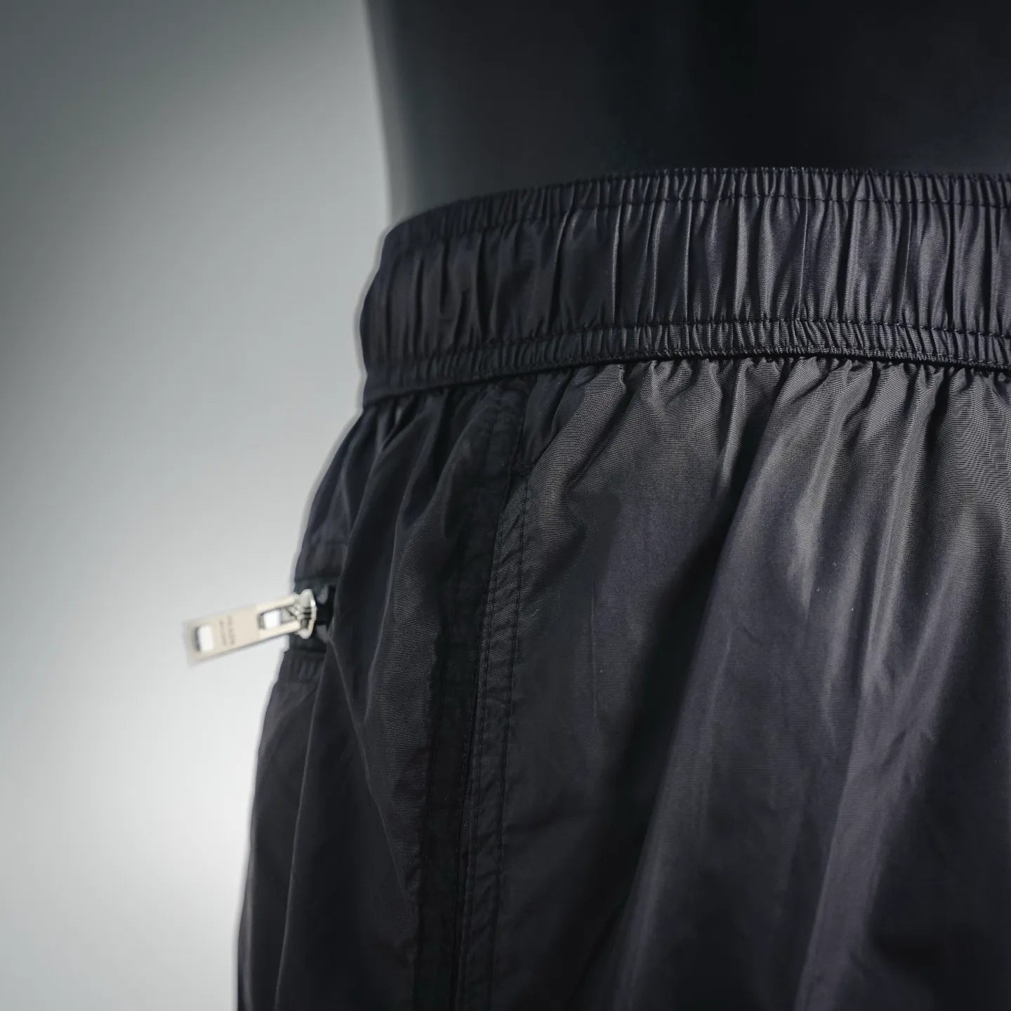 Prada black shorts side strap detail near pocket