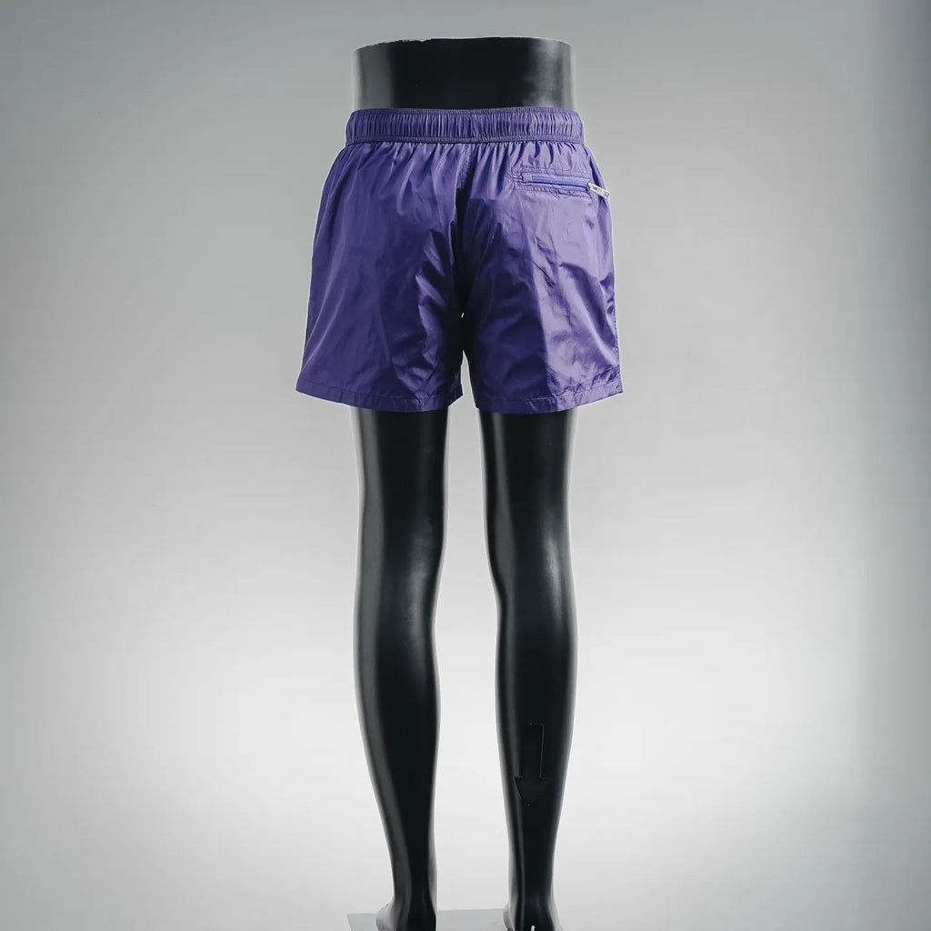 Prada purple nylon shorts, back view, elastic waistband and relaxed cut