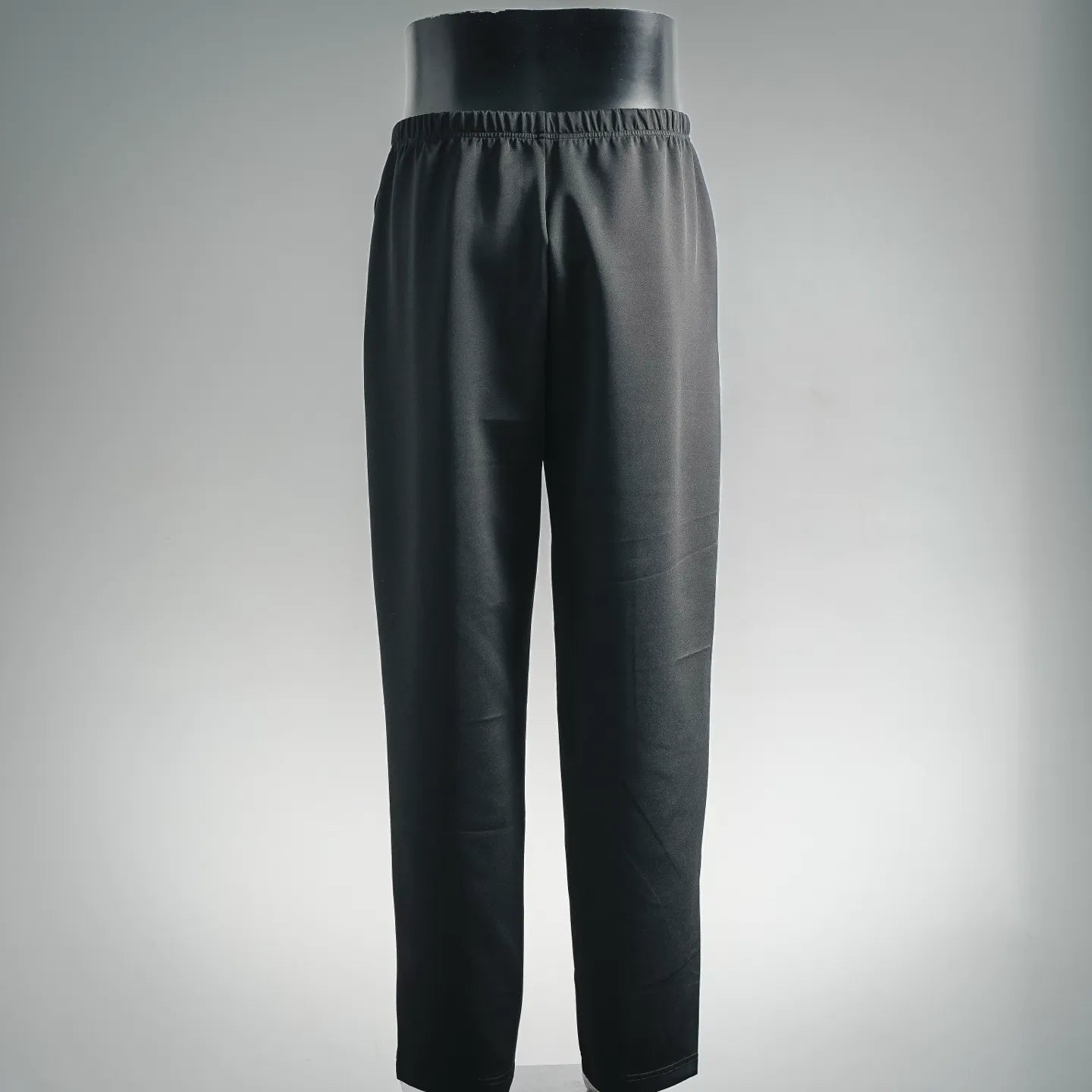 Prada dark trousers with elastic waistband and straight, tapered legs