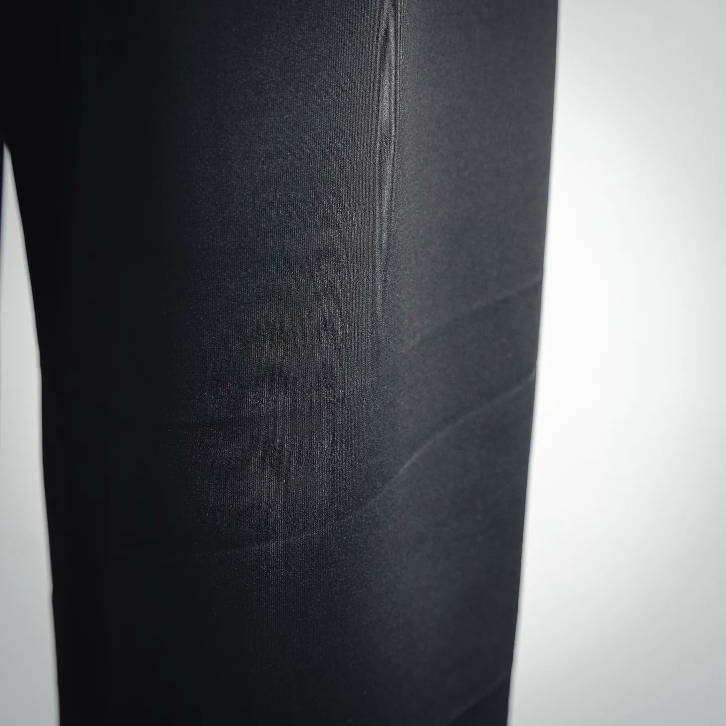 Prada dark pants close-up of fabric and side seam