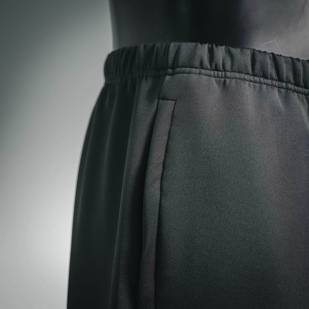 Prada dark pants waistband with elastic and stitched front panel