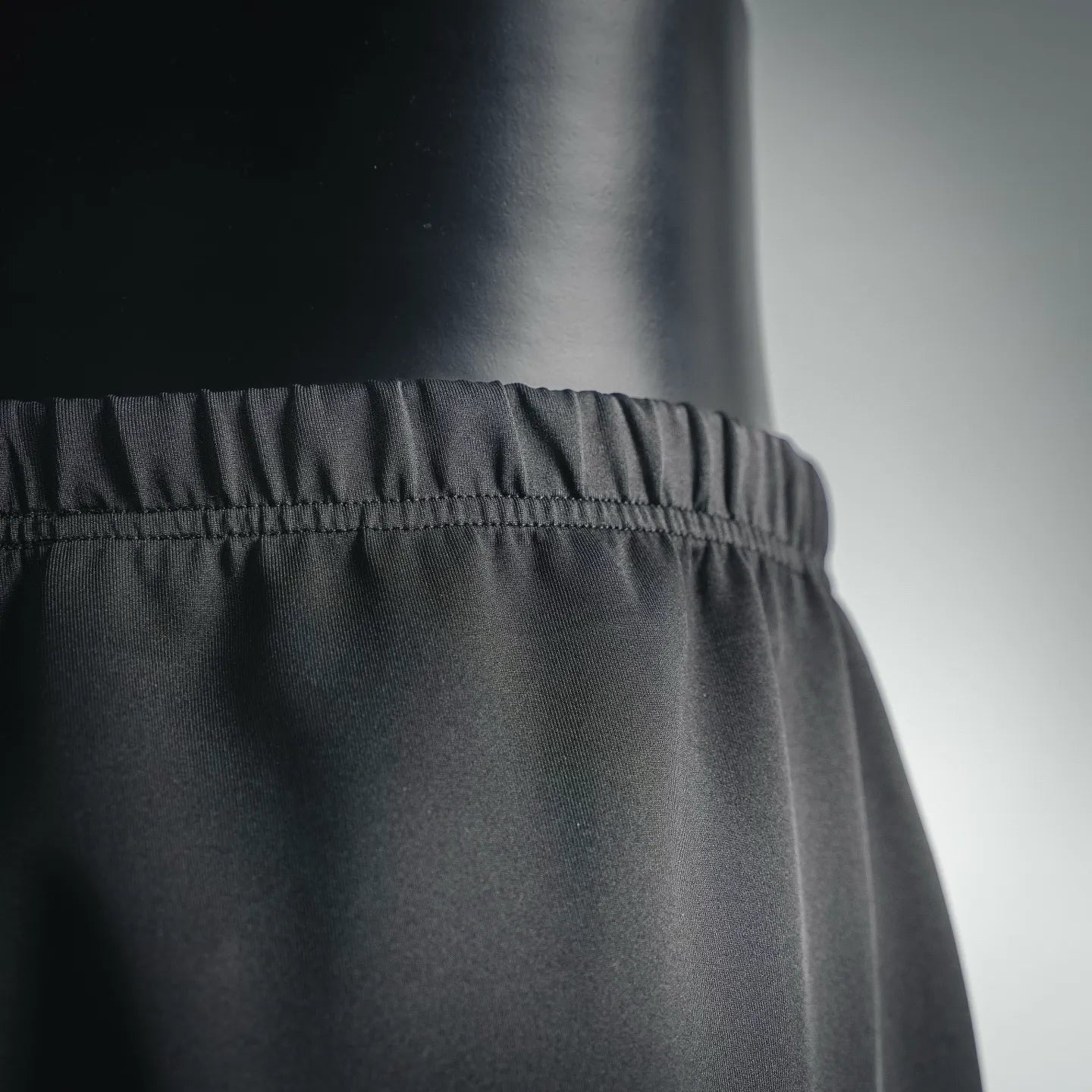 Prada dark pants waistband and front seam detail