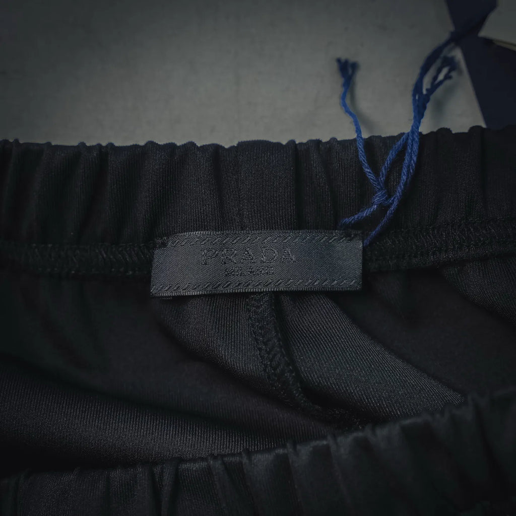Prada dark pants inner waistband label and elastic trim