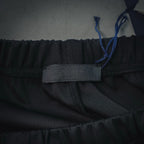 Prada dark pants inner waistband label and elastic trim