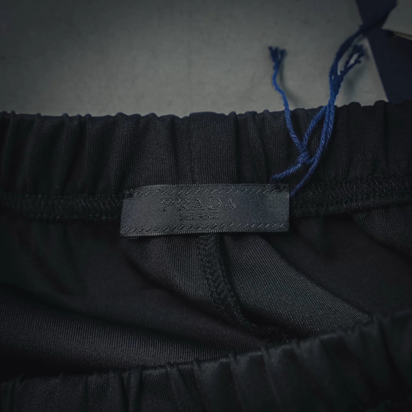Prada dark pants inner waistband label and elastic trim