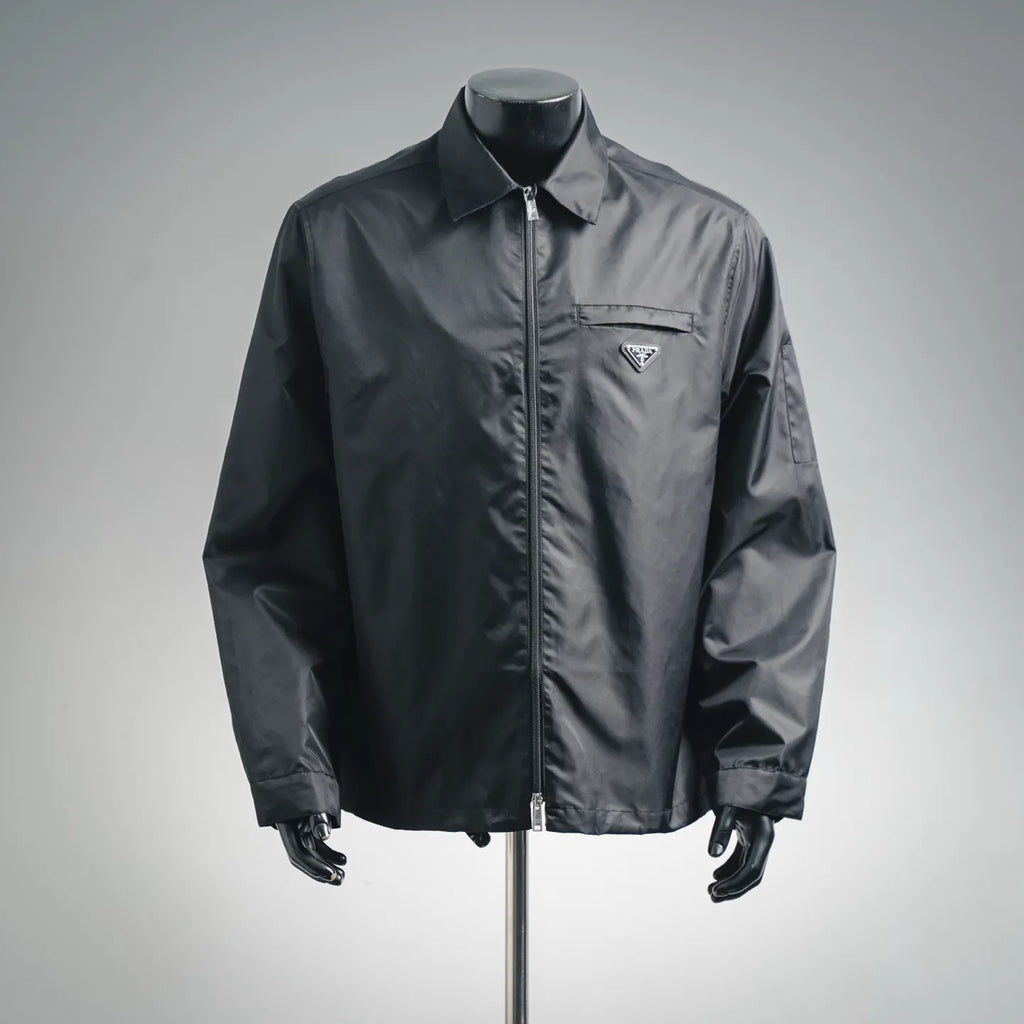 Prada dark gray zip-up jacket with stand collar and triangular logo pocket badge