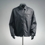 Prada dark gray zip-up jacket with stand collar and triangular logo pocket badge