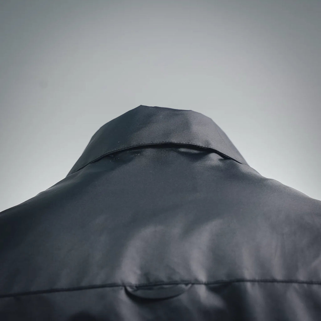 Prada dark gray jacket hood with curved seam and structured top panel