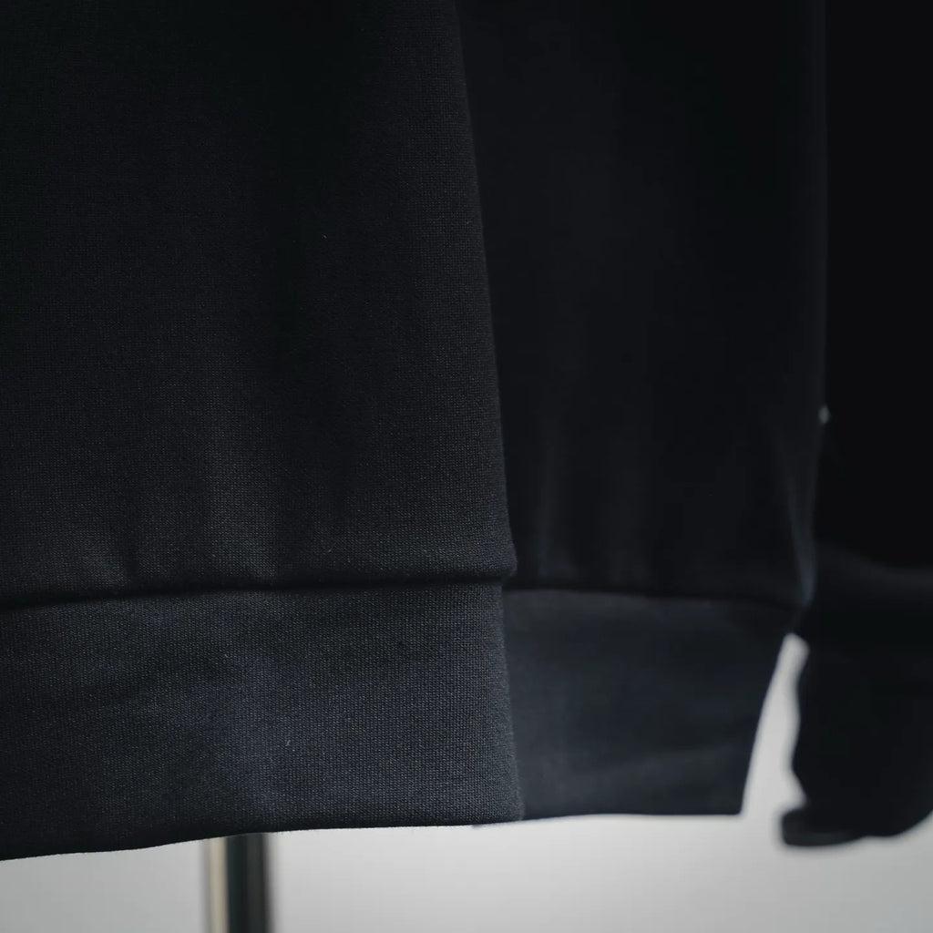 Prada dark jacket hem with elastic cuff detail