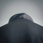 Prada dark jacket collar and neckline seam close-up