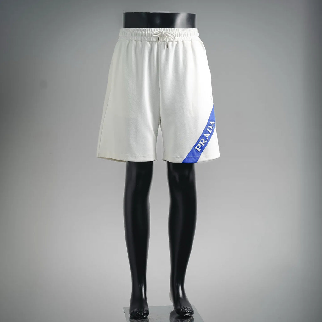 White Prada shorts with elastic waistband and blue side logo patch
