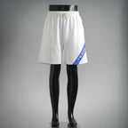 White Prada shorts with elastic waistband and blue side logo patch