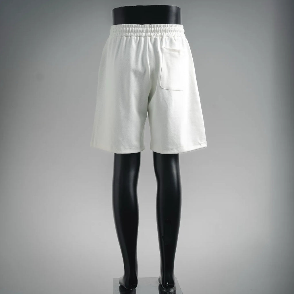 White drawstring shorts with elastic waistband, front view from behind
