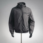 Black hooded jacket with full front zipper and front pocket on mannequin