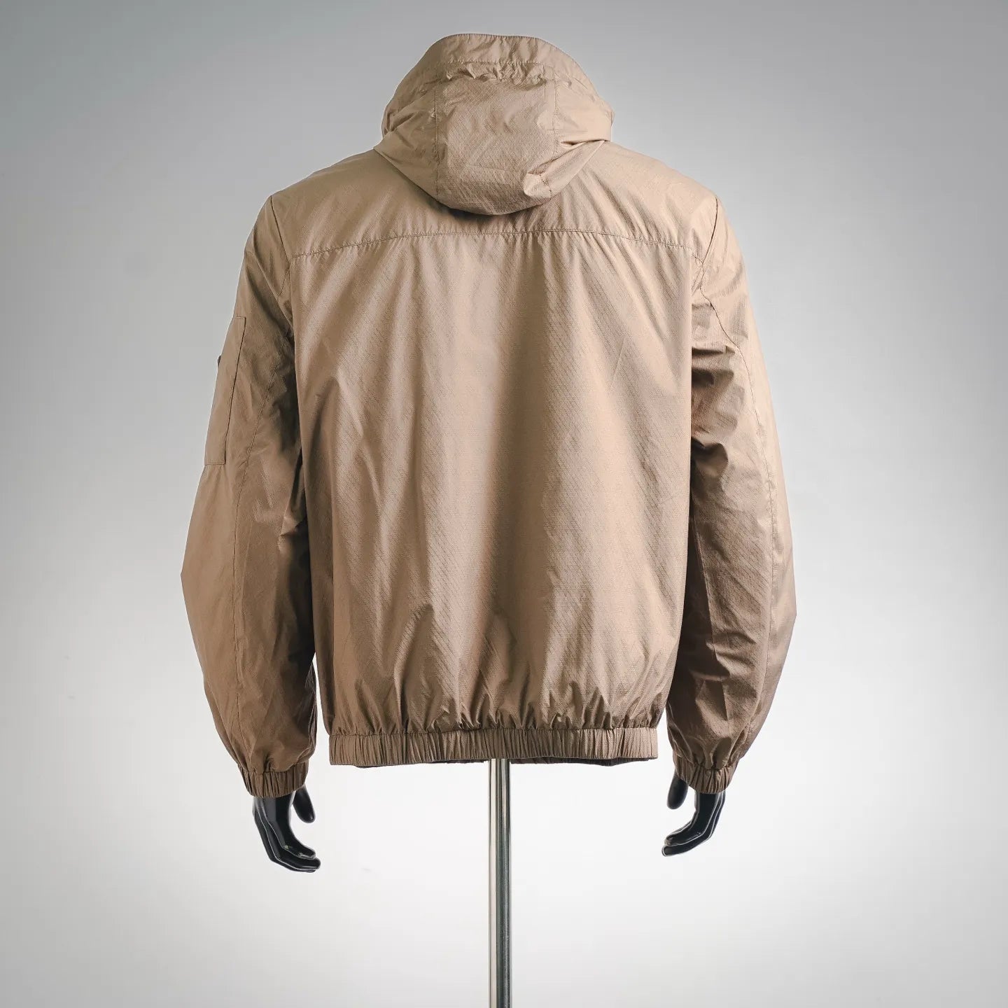 Prada tan hooded jacket, back view with elastic hem and cuffs