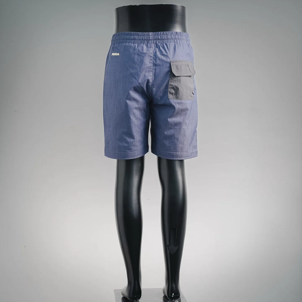Prada blue drawstring shorts, back view with patch pocket detailing